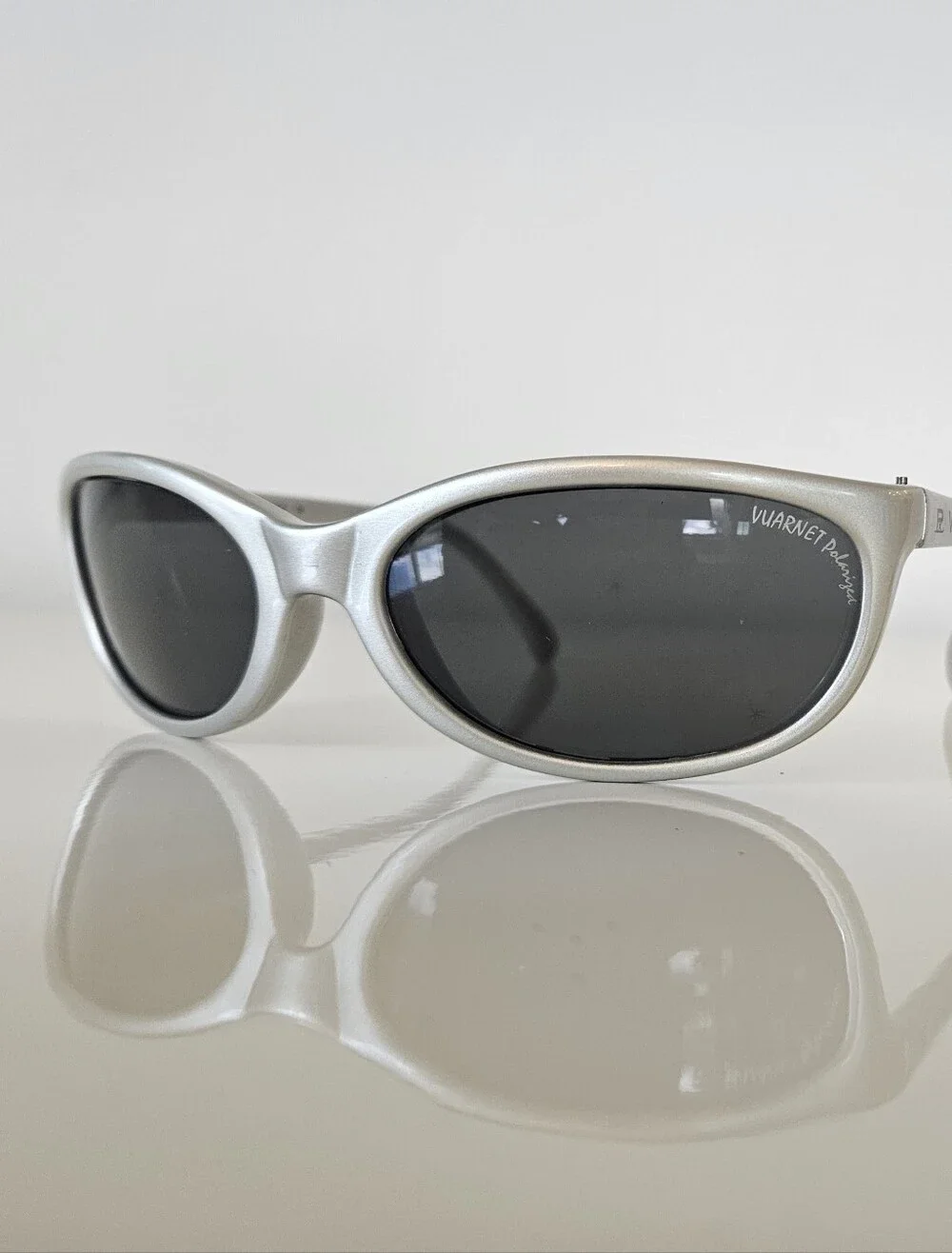 Vuarnet Silver Oval Sunglasses with Dark Lenses